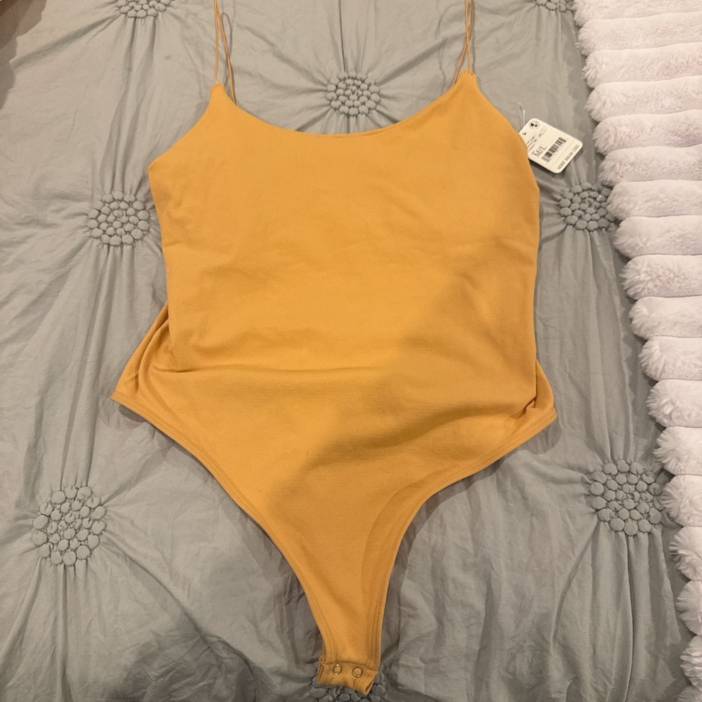Free people bodysuit, size M/L